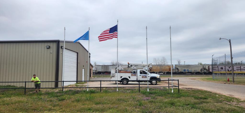 03 / FLAGPOLES & FLAGS